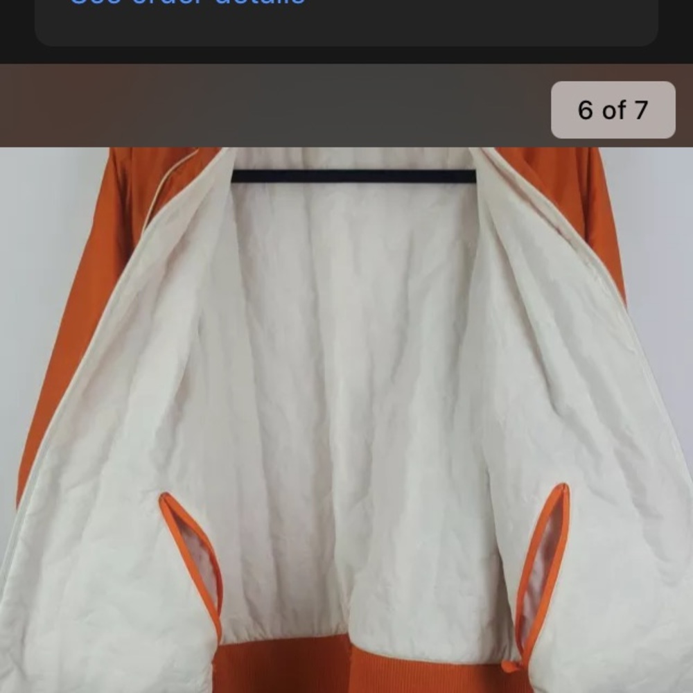 Helly Hansen Thinsulate womens’ XL reversible orange + white zip front jacket.